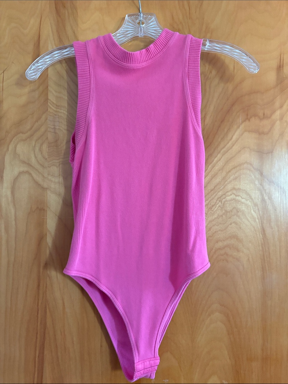 Sleeveless Pink Ribbed High-Neck Bodysuit